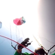 Illustration for article titled Tandem Paragliding Parachute Rips In Half During Stunt